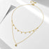 Full view of gold layered CZ choker necklace laid in a circle.