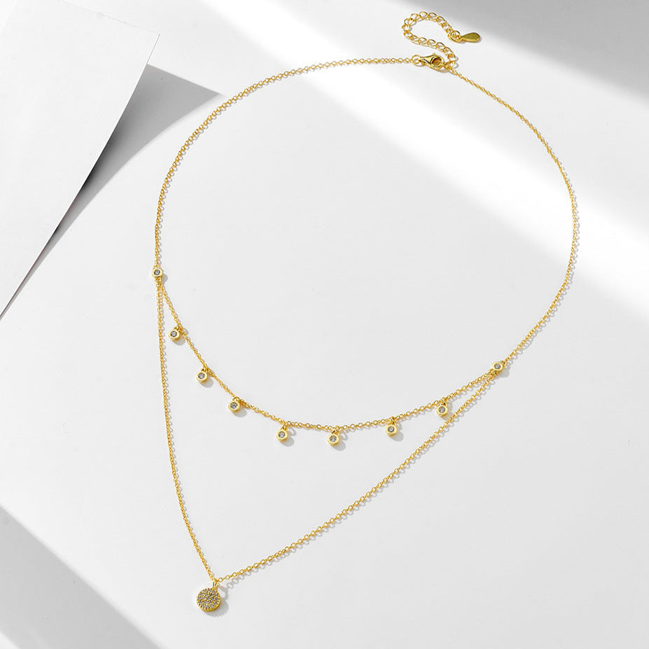 Full view of gold layered CZ choker necklace laid in a circle.