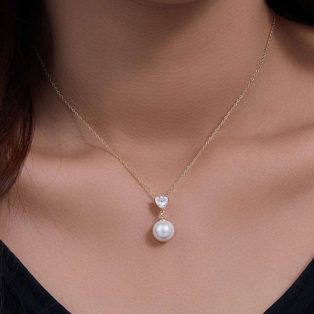 Woman wearing gold S925 Pearl Heart Necklace 
