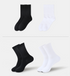 Product layout showing pairs of black and white ribbed sports socks arranged in rows against white background with dividing line