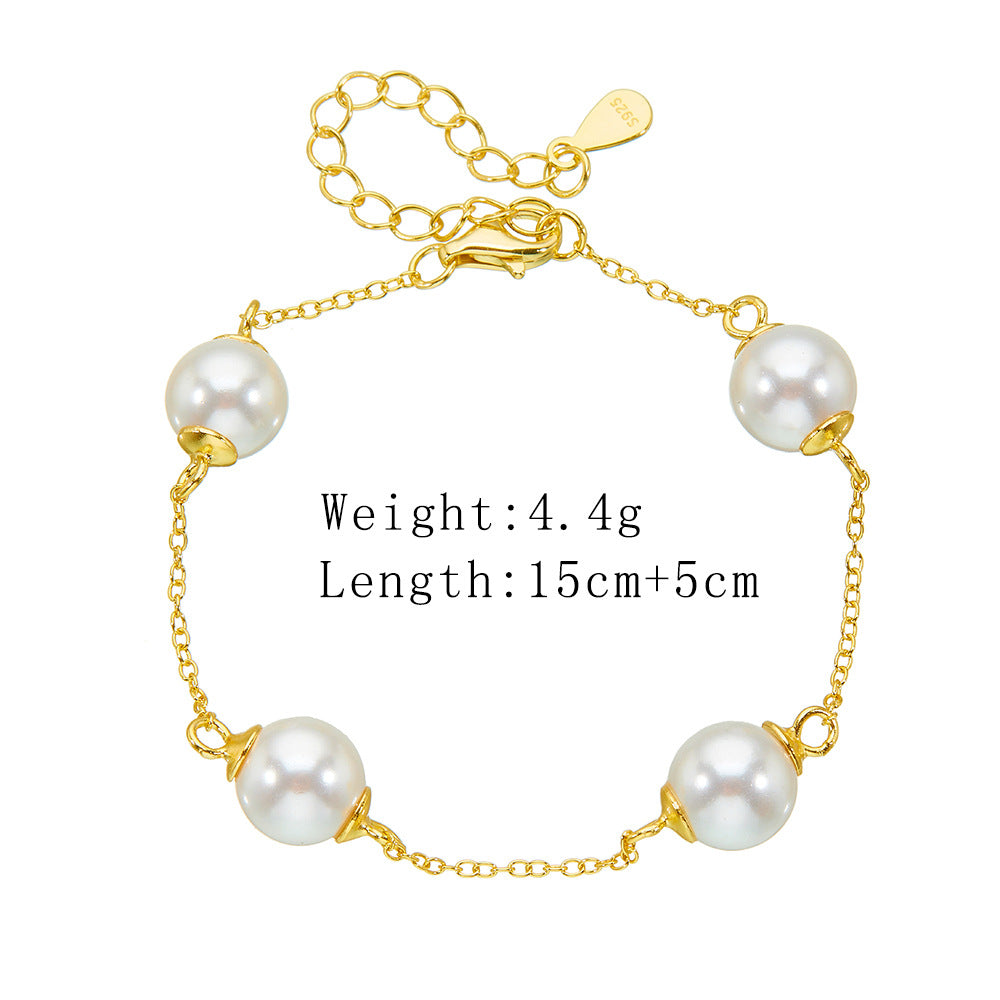 Product display of the gold pearl bracelet with size and weight details: 4.4g, 15cm + 5cm.

