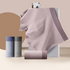 Cotton boxer briefs display with cotton boll, color swatches, and fabric rolls in neutral tones