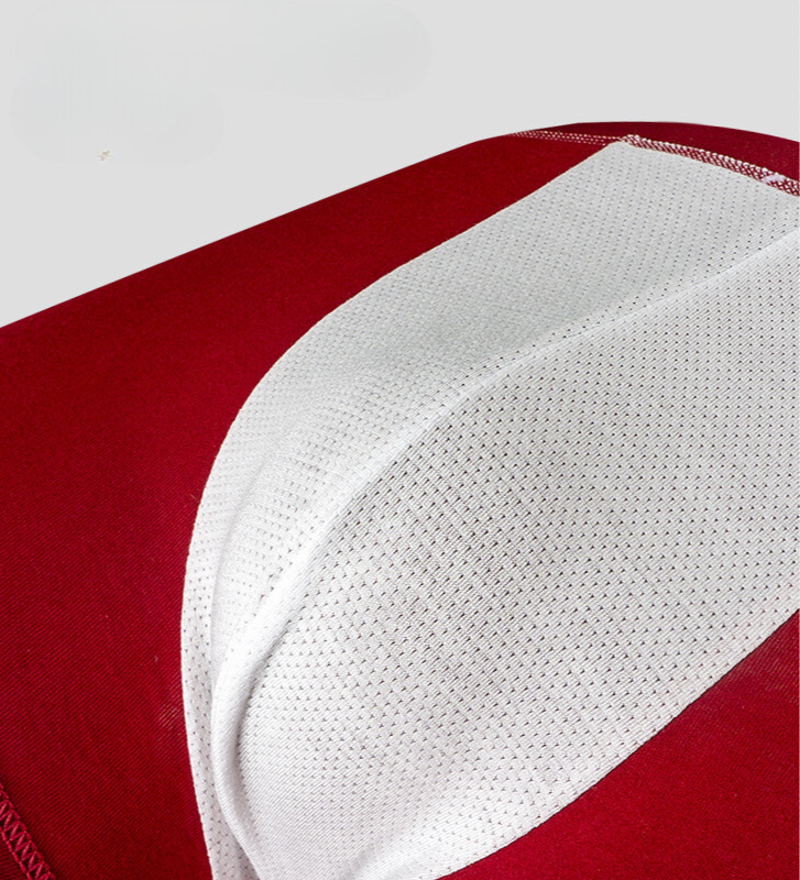 Close-up detail of burgundy underwear with white stripe fabric detail showing breathable mesh construction