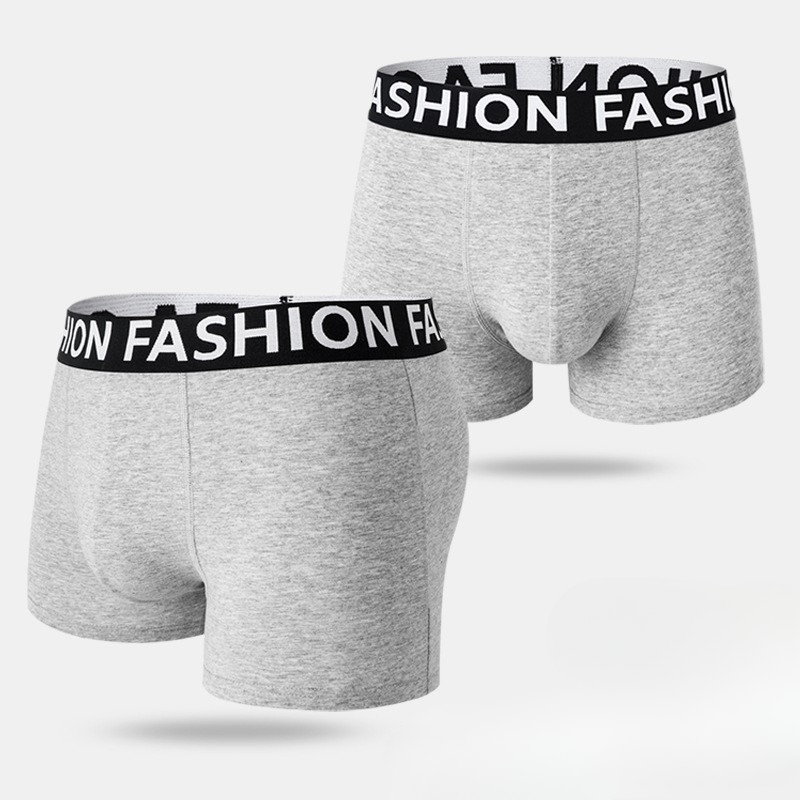 Two gray men's boxer briefs with black "FASHION" elastic waistband shown from front and back views