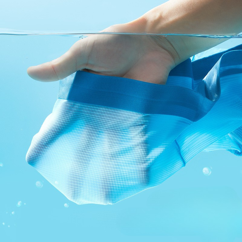 Ice silk underwear in light blue shown underwater, demonstrating cooling and moisture-wicking properties