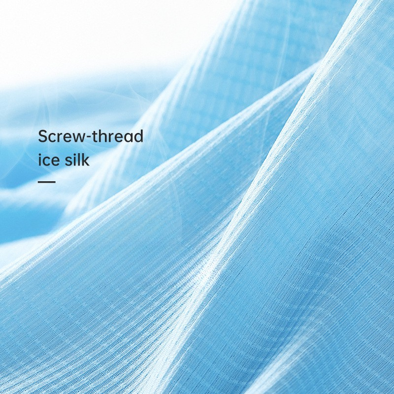 Close-up of screw-thread ice silk fabric texture in light blue, displaying premium material detail
