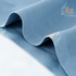 Detailed texture view of blue men's underwear fabric with delicate pattern print