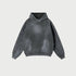 Charcoal gray oversized hoodie with kangaroo pocket displayed against light gray background