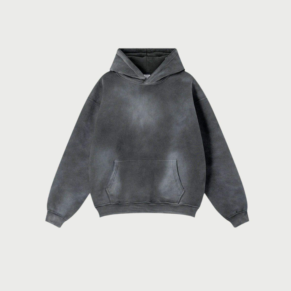 Charcoal gray oversized hoodie with kangaroo pocket displayed against light gray background