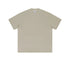 Light beige oversized t-shirt with crew neck and drop shoulder design photographed flat against white background