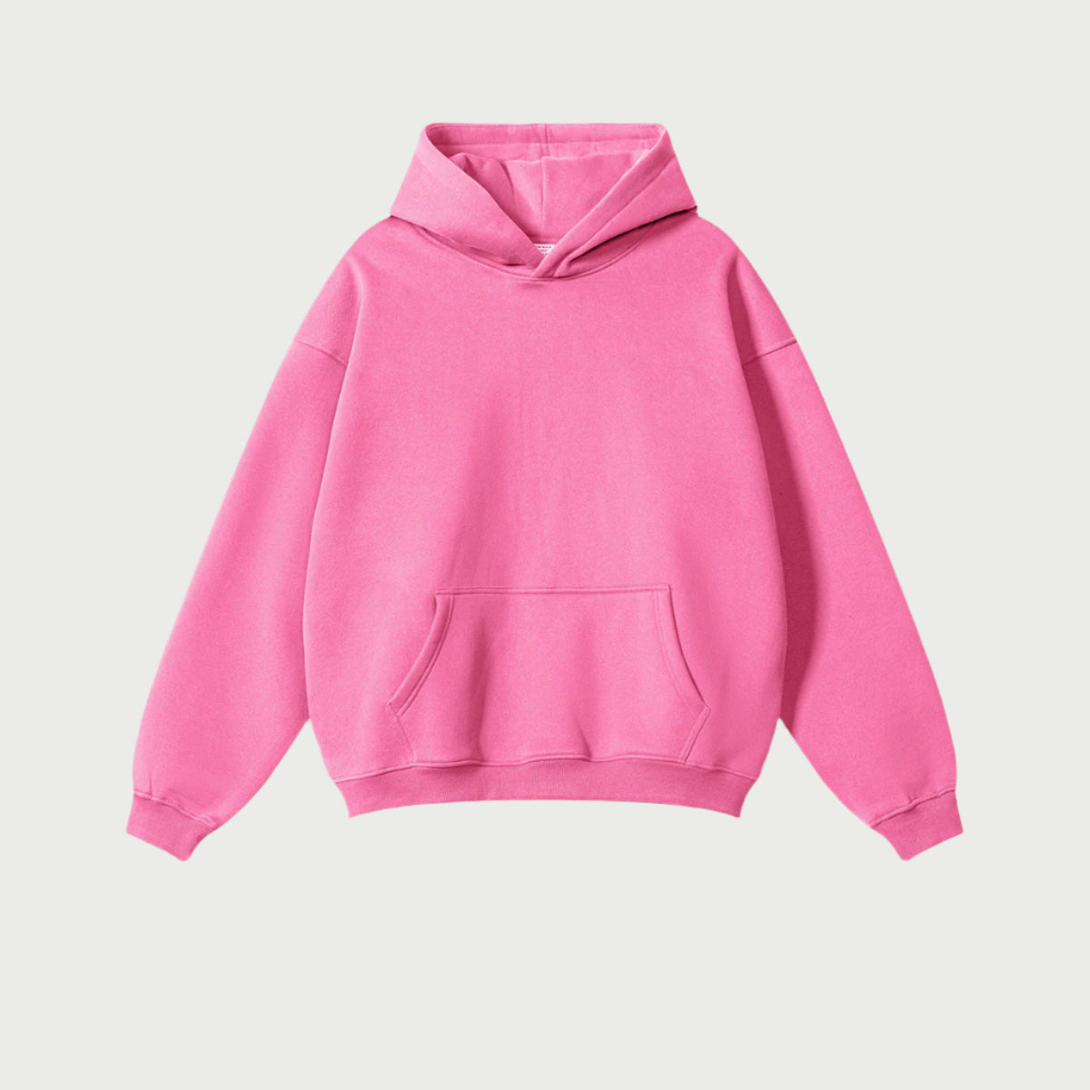 Pink oversized hoodie with front pocket on light gray background