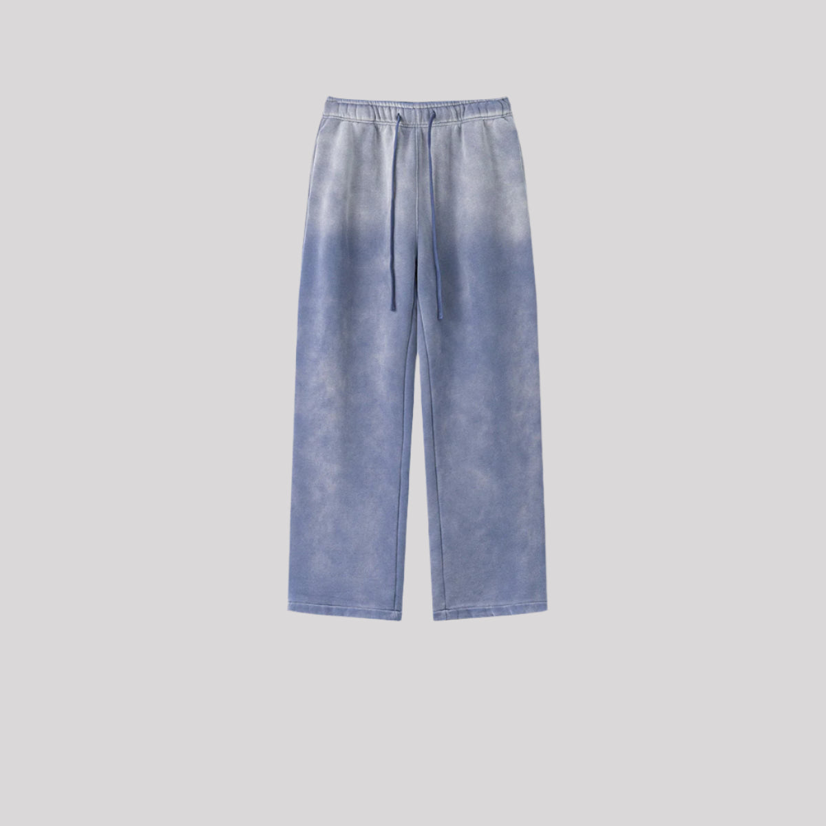 Light blue ombré sweatpants with drawstring waist and wide-leg design against neutral background