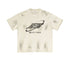 Flat lay of vintage white Beattube t-shirt with faded logo