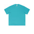 Turquoise blue oversized t-shirt with crew neck and drop shoulder design photographed flat against white background.