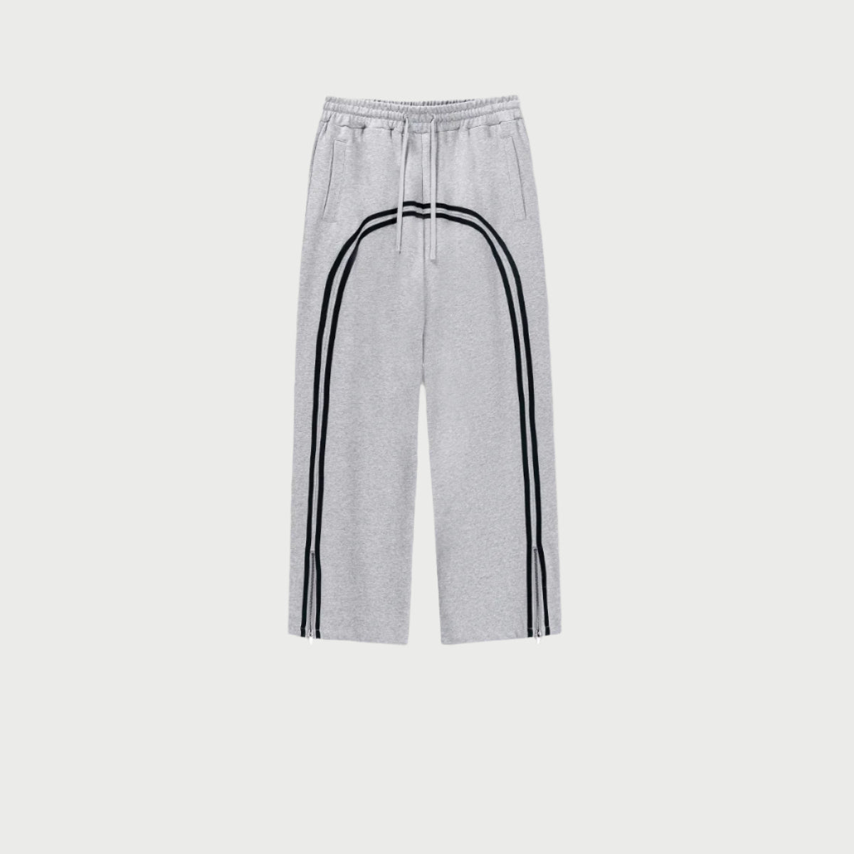 Product shot of light gray track pants with black double side stripes, showing elastic waistband and ankle zip closure