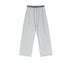 Gray wide-leg sweatpants with an elastic waistband and drawstring, laid flat on a neutral textured surface.