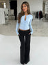 Soft baby blue knit cardigan sweater styled for fall