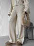 Close up of beige knit lounge set with zip-up jacket and pants