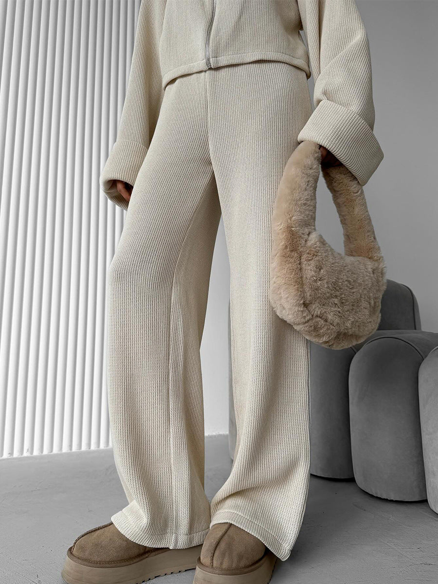Close up of beige knit lounge set with zip-up jacket and pants