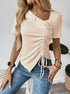 Asymmetric hem beige top styled with blue jeans