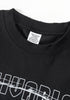 Close-up of black graphic tee collar with visible label and upper chest print.