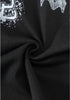 Zoomed-in view of twisted black cotton fabric to highlight texture and softness.