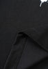 Interior stitching detail on black T-shirt hem showing construction quality.