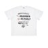 White oversized T-shirt with mixed 'Believable' typography designs laid flat on textured background.