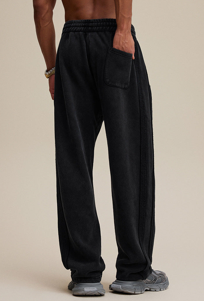 Black baggy sweatpants, back view with single pocket