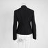 Back view of black blazer showing fitted silhouette