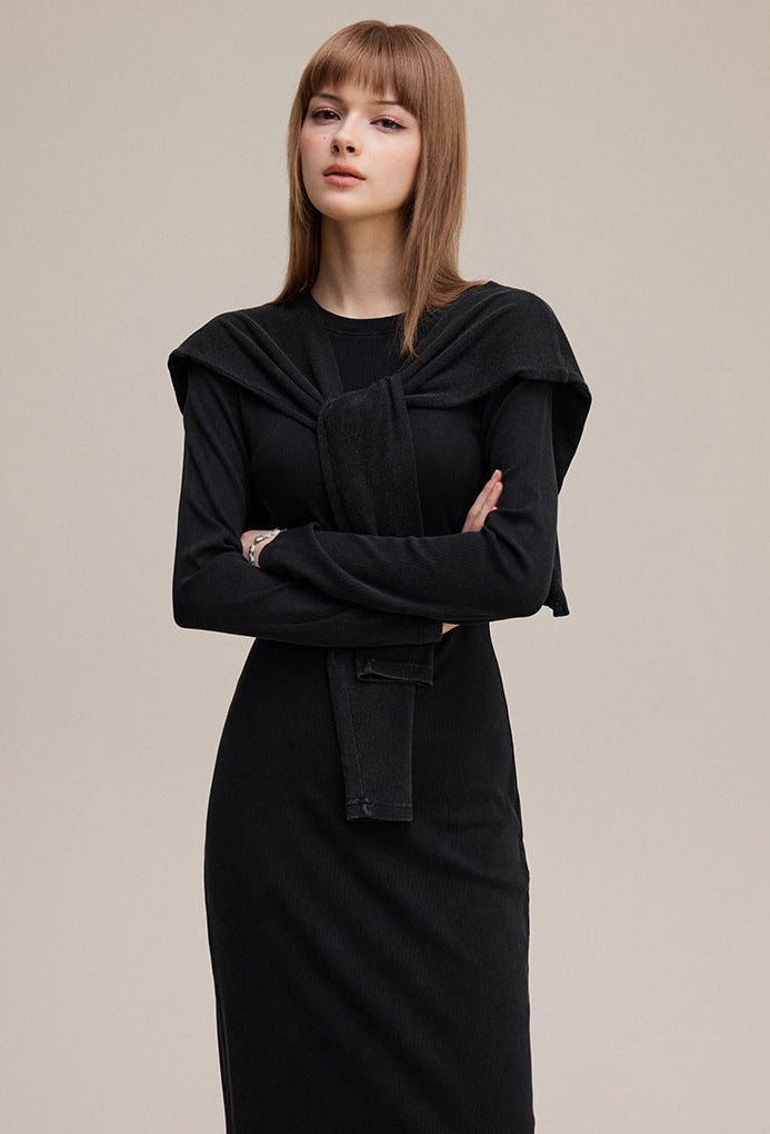 Black bodycon maxi dress with shawl, three-quarter view, arms crossed