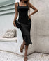 Black bodycon midi dress with square neckline and sleek fit captured in angled front view.