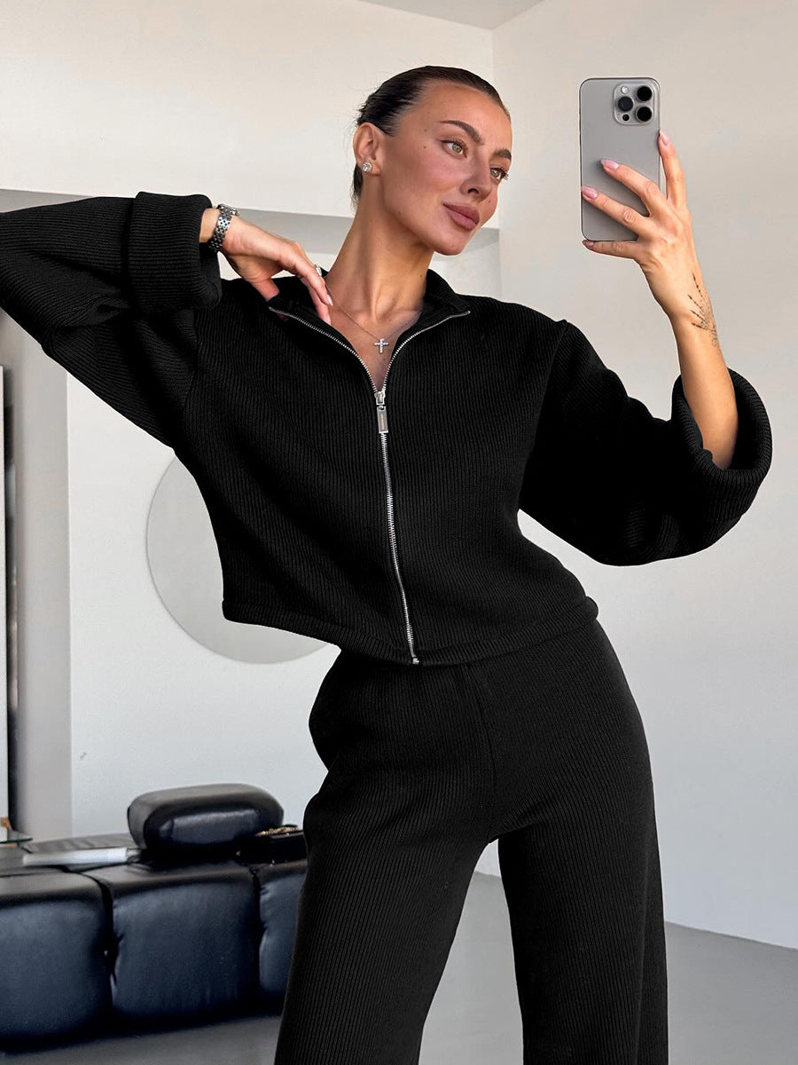Black knit lounge set styled with wide leg pants