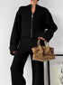 Oversized black knit lounge set with chic street style