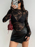 lace top with black, sheer floral mesh crew neck, long sleeves, styled with leather mini skirt, front view