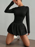 Women’s black mini dress with bubble skirt long sleeve cocktail style outfit