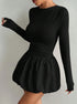 Black cocktail dress women’s long sleeve mini dress with bubble skirt side view