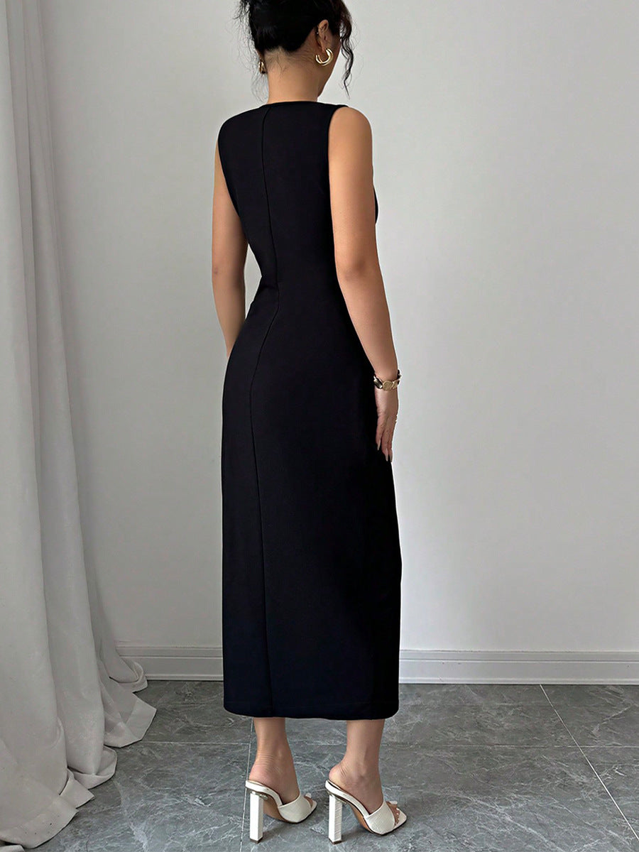 Back view of woman wearing a black sleeveless slit dress against a plain background