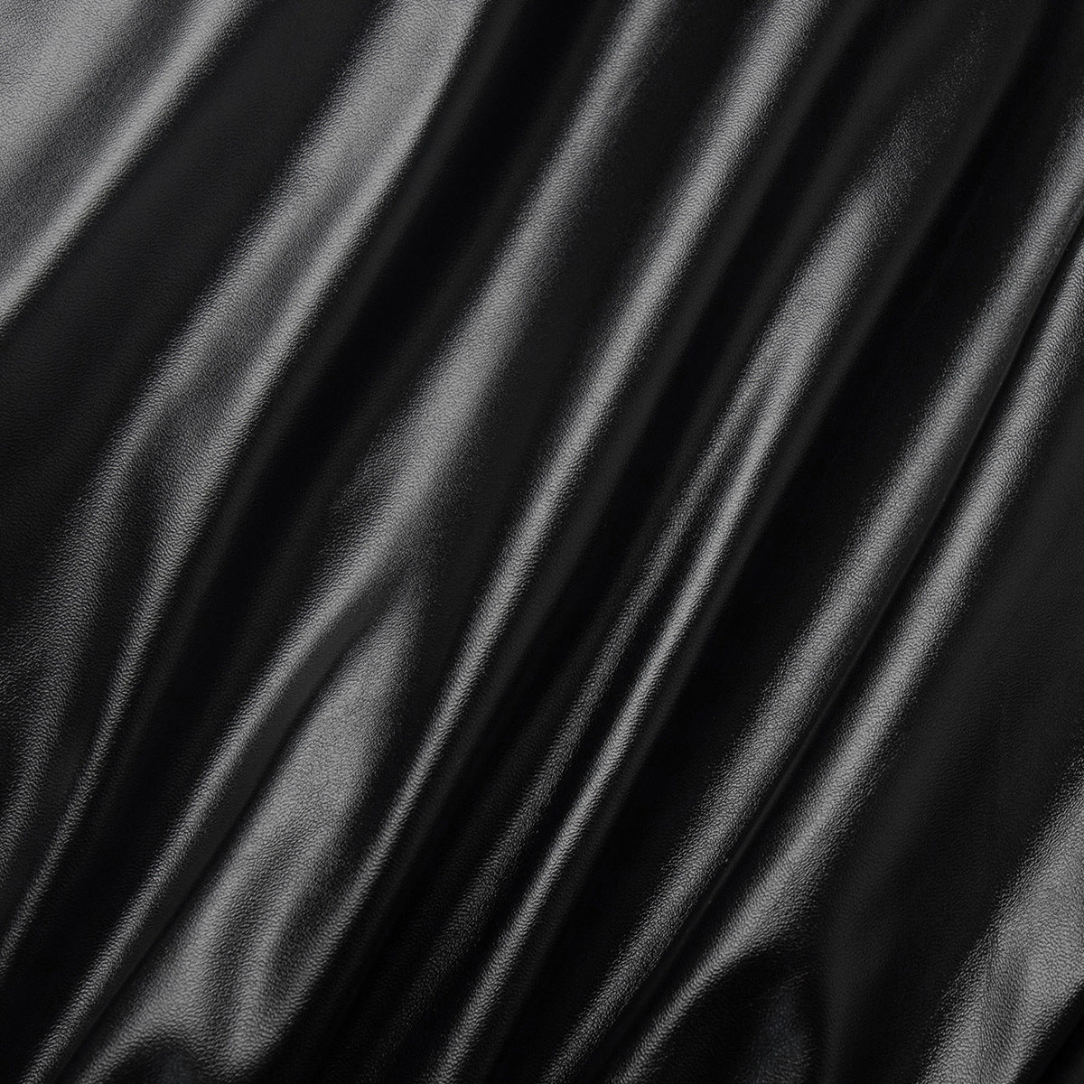 PU leather fabric close-up smooth black texture