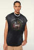 Model wears black ram graphic tank with chain necklace and khaki pants