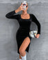 Black bodycon velvet dress with long sleeves, square neckline, and high slit shown in angled mirror pose.