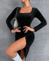 Black velvet dress with long sleeves and high thigh slit shown in close-up front angle.
