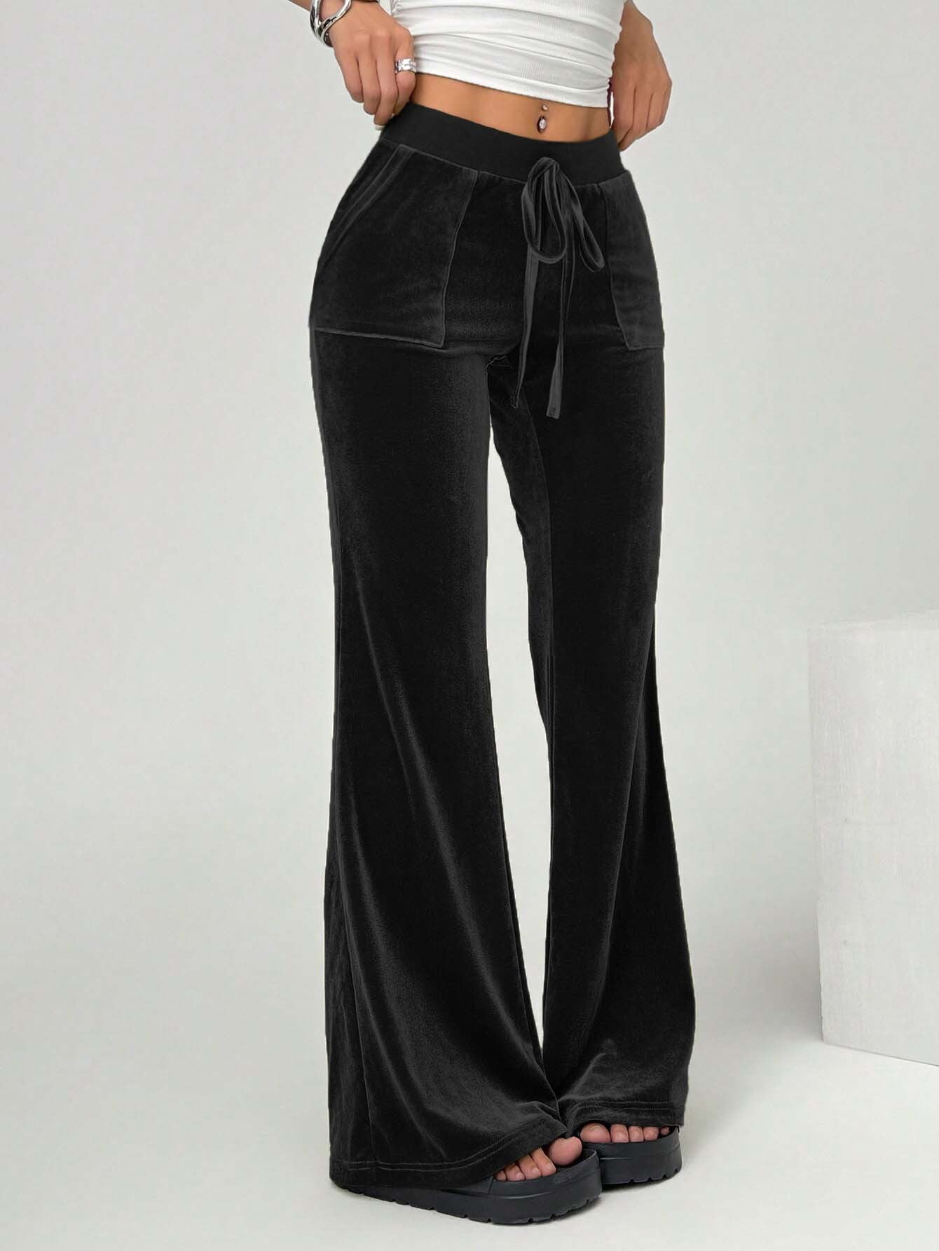 black velvet yoga flare pants front angled view