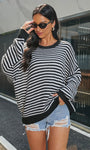 black white striped oversized sweater street style front view