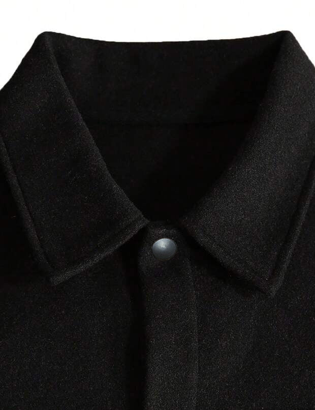 black wool jacket collar and neckline close-up