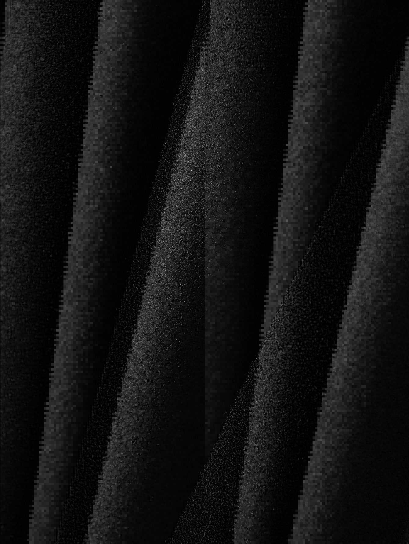 black wool jacket fabric texture close-up
