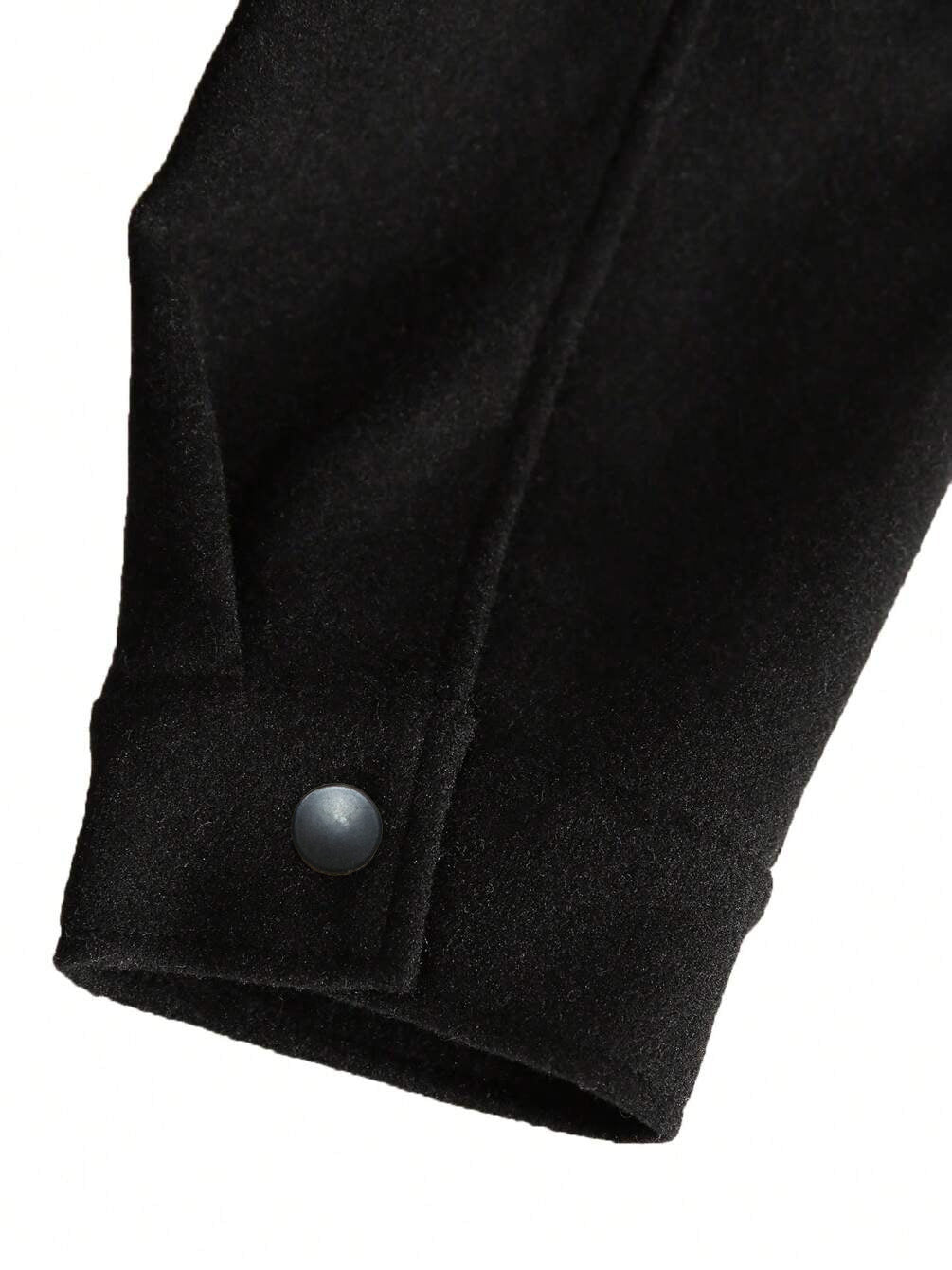 black wool jacket side pocket and button close-up