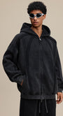 Black zip hoodie, hands-in-pocket, streetwear silhouette