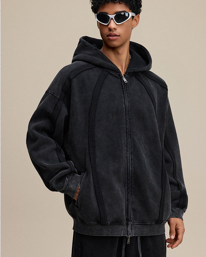 Black zip hoodie, hands-in-pocket, streetwear silhouette