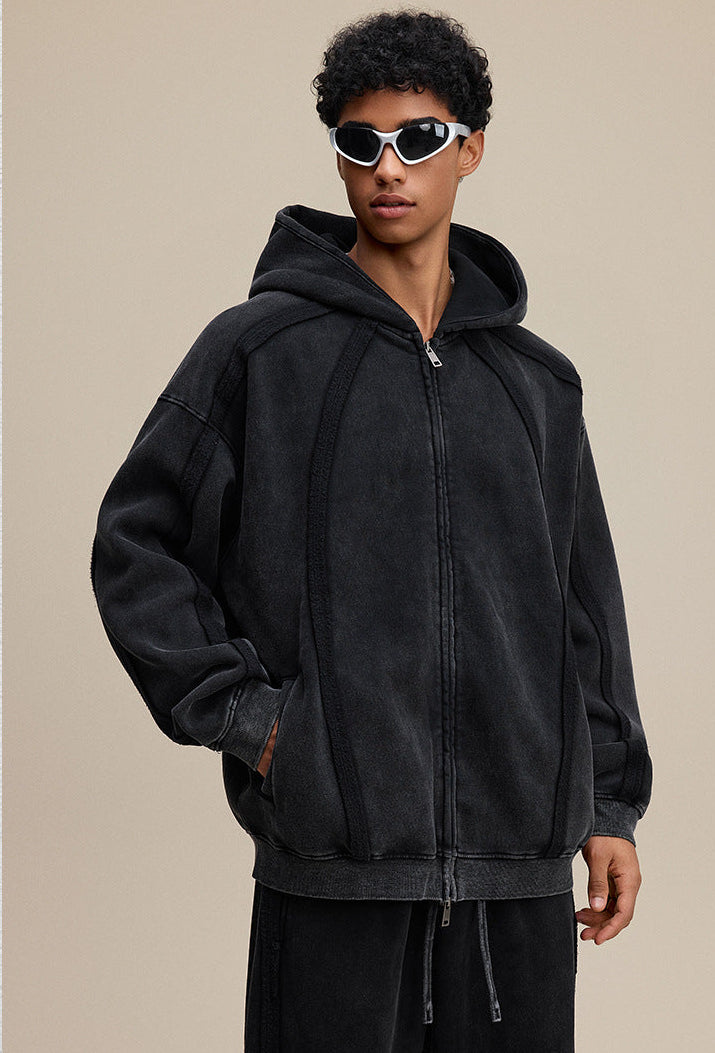 Black zip hoodie, hands-in-pocket, streetwear silhouette
